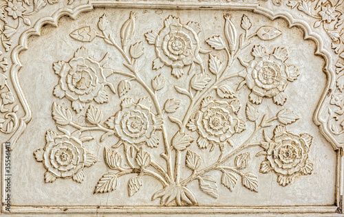 Artwork on marble at the Bibi ka Maqbara, built by Azam Shah in 1678, as a son's tribute to his mother, Begum Rabia Durrani, the Queen of Mughal emperor Aurangzeb. Aurangabad, Maharashtra, India