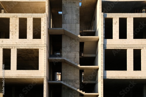 Construction of a new unfinished residential building. View of the stairs structure.