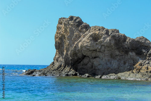 rocky mountains with sea