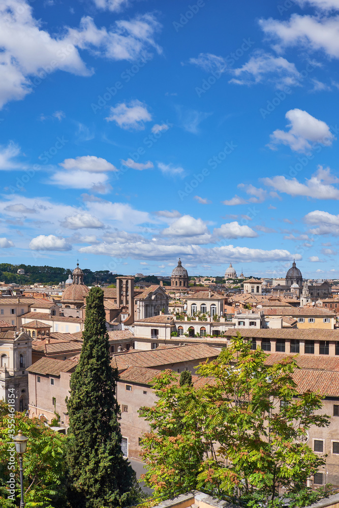 Roma, Italy, areal view to the side of Capitol Hill with rouins of the Roman Forum on the bright day