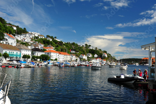 Risoer harbour in Norway on a sunny summer day. © RandiGrace
