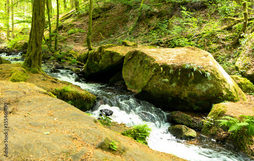 Wild and romantic Karlstal gorge in spring near Trippstadt Rhineland Palatinate, Germany photo