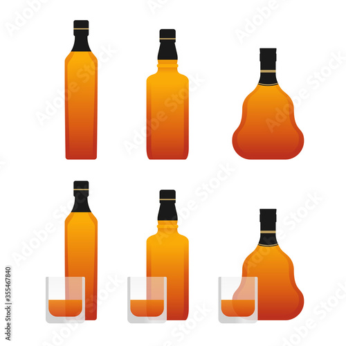 Alcoholic drinks bottles - whisky, rum or cognac - in three variations and with drinking glasses