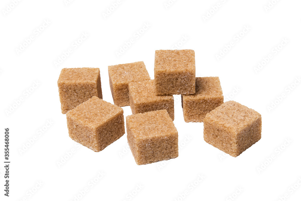 Pieces of cane sugar isolated on white background Pieces of cane sugar isolated on white background