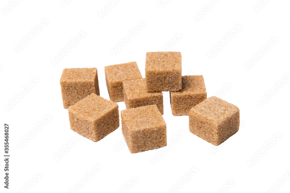 Pieces of cane sugar isolated on white background Pieces of cane sugar isolated on white background