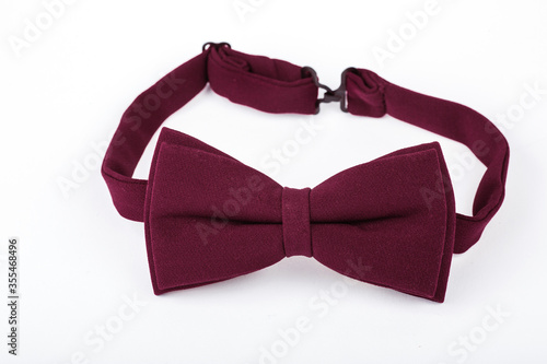 Burgundy bow tie isolated on white background Fototapeta