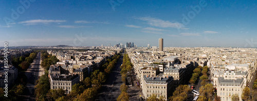 panoramic view from the arch de triomphe at the arche de la defense at Paris in the 16 arrodisement in autumn under a blue sky