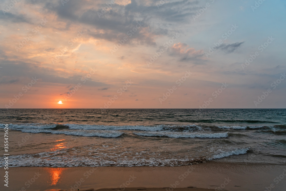 Sri Lanka ocean sunset view, beach seascape with picturesque waves