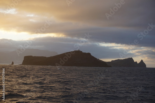 Sunset view on Ponta de Sao Laurenco from the ferry, october 2019