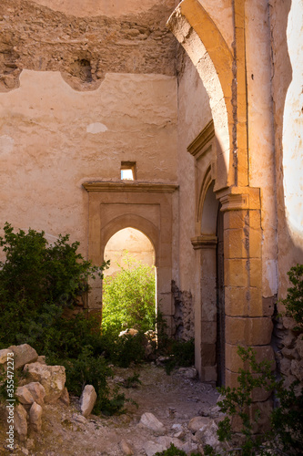 Gate in a yard of abandoned house, Morocco photo