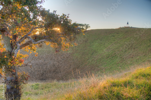 Sunrise view of Mount Eden in Auckland, New Zealand photo