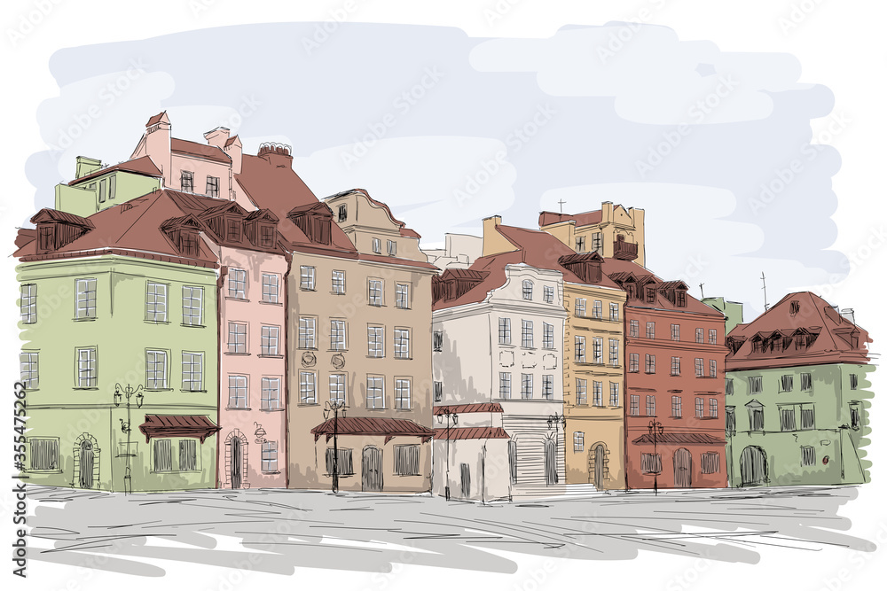 An old European city with colorful multi-story buildings. Many windows overlooking the street.
