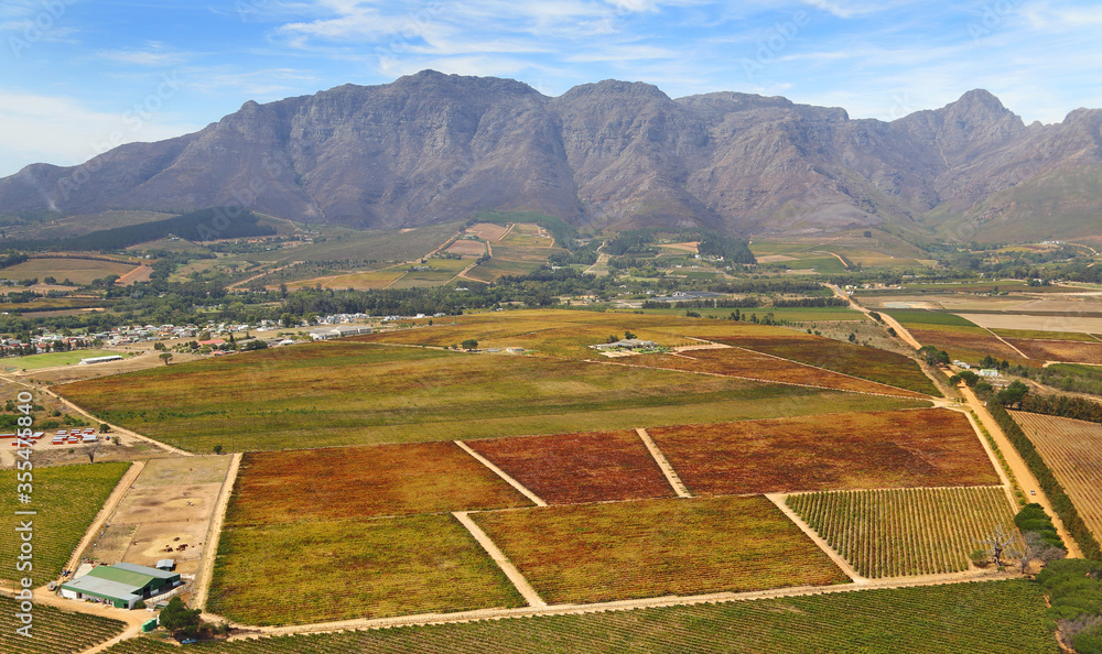 Cape Town, Western Cape / South Africa - 03/13/2015: Aerial photo of wine farms with mountains in the background