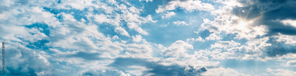 Backgrounds and textures. Blue beautiful sky with clouds. Backgrounds and textures. Blue beautiful sky with clouds.