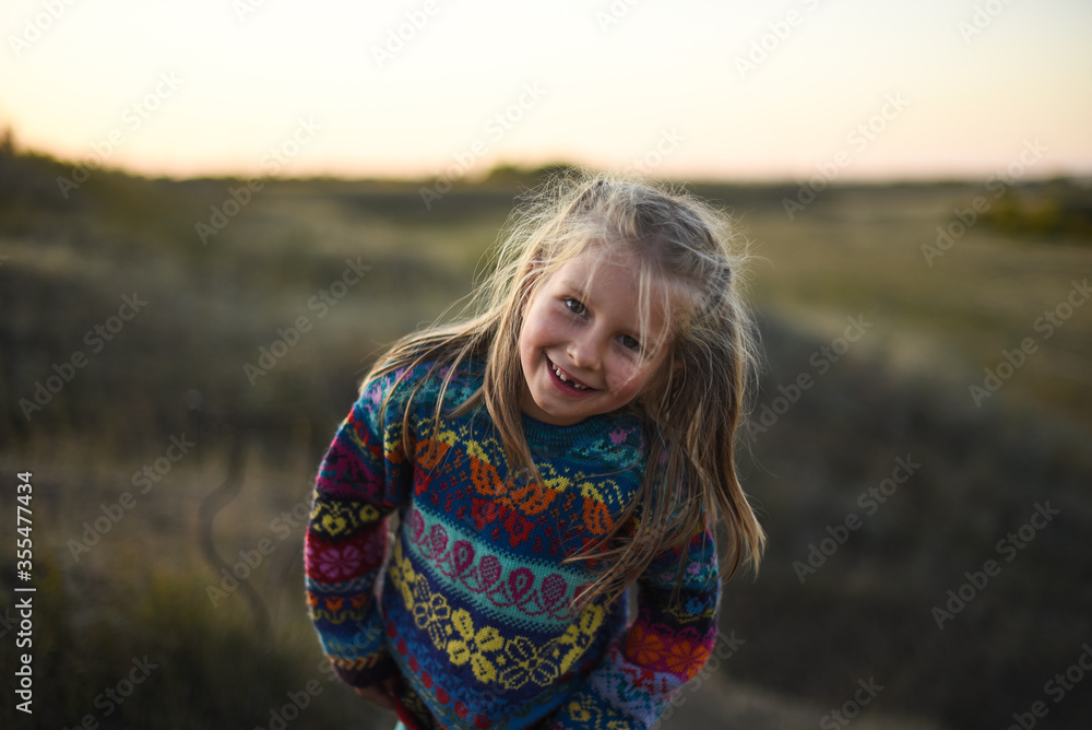 child playing in the woods child playing in the woods
