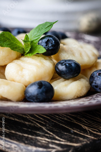 Lazy cottage cheese dumplings with fresh berry. Simple and healthy breakfast