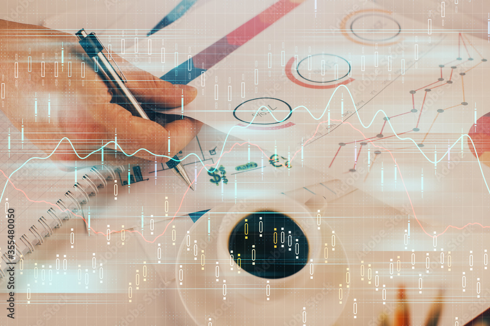 Multi exposure of man planing investment with stock market forex chart. Multi exposure of man planing investment with stock market forex chart.