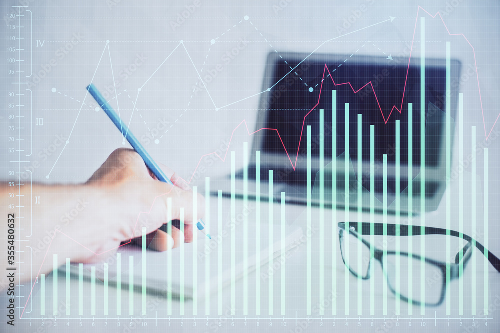 Multi exposure of man hands with stock market forex graph. Multi exposure of man hands with stock market forex graph.