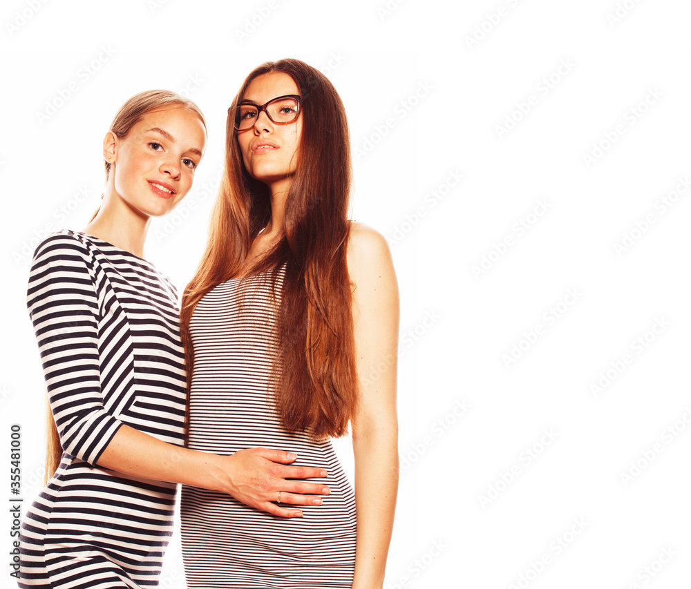 two young workers isolated on white, same dresses in strip two young workers isolated on white, same dresses in strip