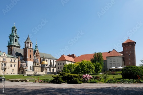 Royal Wawel Castle and beautiful garden with colorful flowers. Cracow, Poland. 