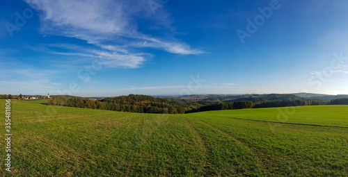 scenic panorama view of natural landscape under a cloudy sky