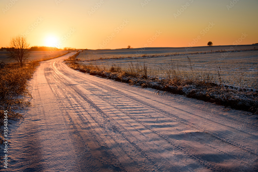 Winter, snow on the road, sunset, orange