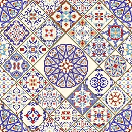 Seamless ceramic tile with colorful patchwork. Vintage multicolor pattern in turkish style. Endless pattern can be used for ceramic tile, wallpaper, linoleum, textile, web page background. Vector