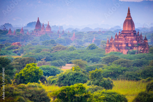 View of a Majestic Ancient Pagoda inside a Forest in Bagan, Myanmar. Beautiful Morning Time, Copy Space 