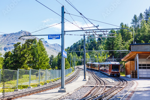 Swiss mountain train crossed Alps, railway in the mountains