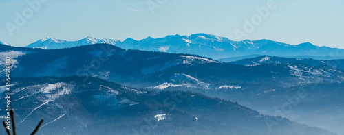 Beskid Zywiecki and Western Tatras from Magurka Wislanska hill in winter Beskid Slaski mountains in Poland