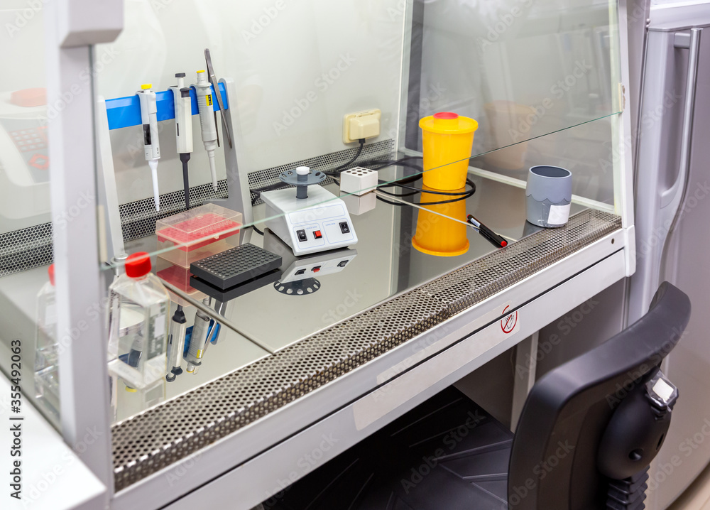 Laboratory medical equipment on special table in the center of epidemiology for the search and solution of viral diseases Laboratory medical equipment on special table in the center of epidemiology for the search and solution of viral diseases
