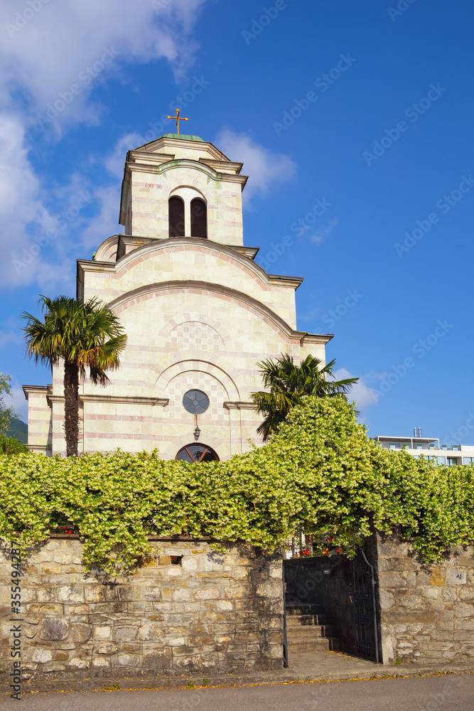 Fototapeta premium Religious architecture. Montenegro, Tivat city. View of Orthodox Church of Saint Sava on sunny spring day