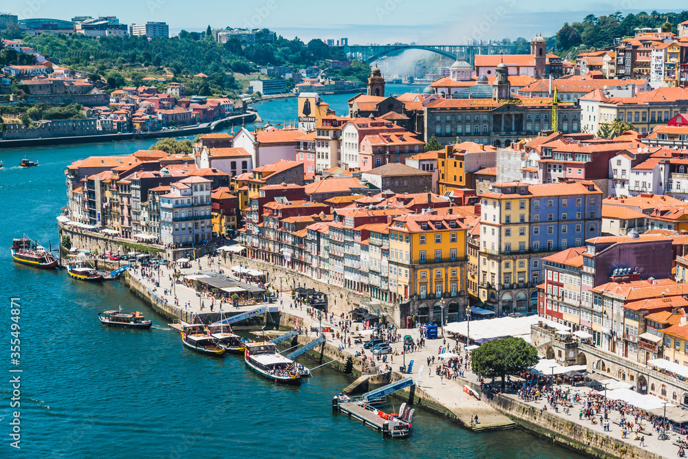 Panoramic view of  Oporto and  the Douro River with typical boats, Portugal.