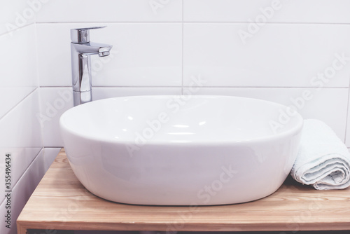 Modern Bathroom With White Sinks White Towel Horizontal