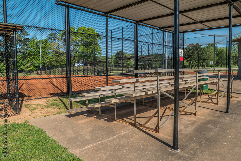 Empty bleachers at a baseball park