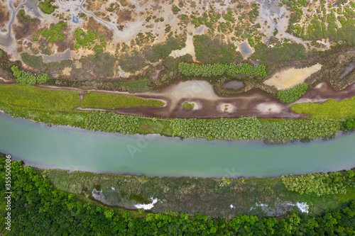 Aerial view of a river around the sea coast
 photo