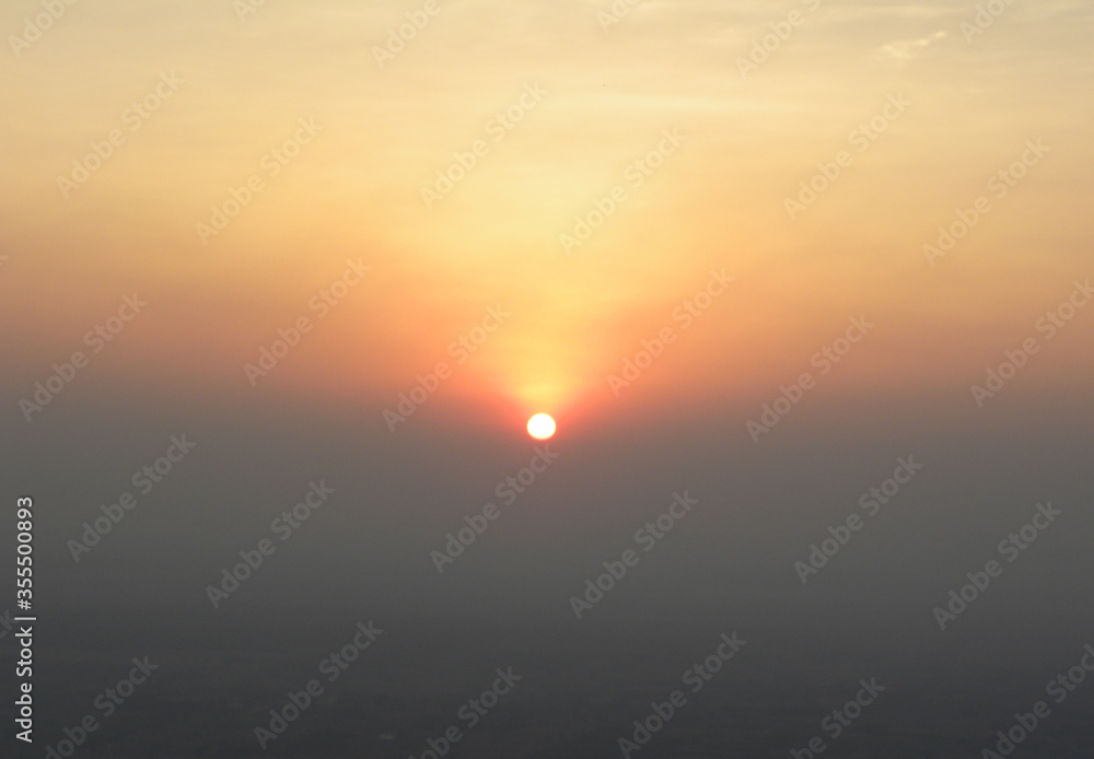 Scenic view of sunrise on top of mountain