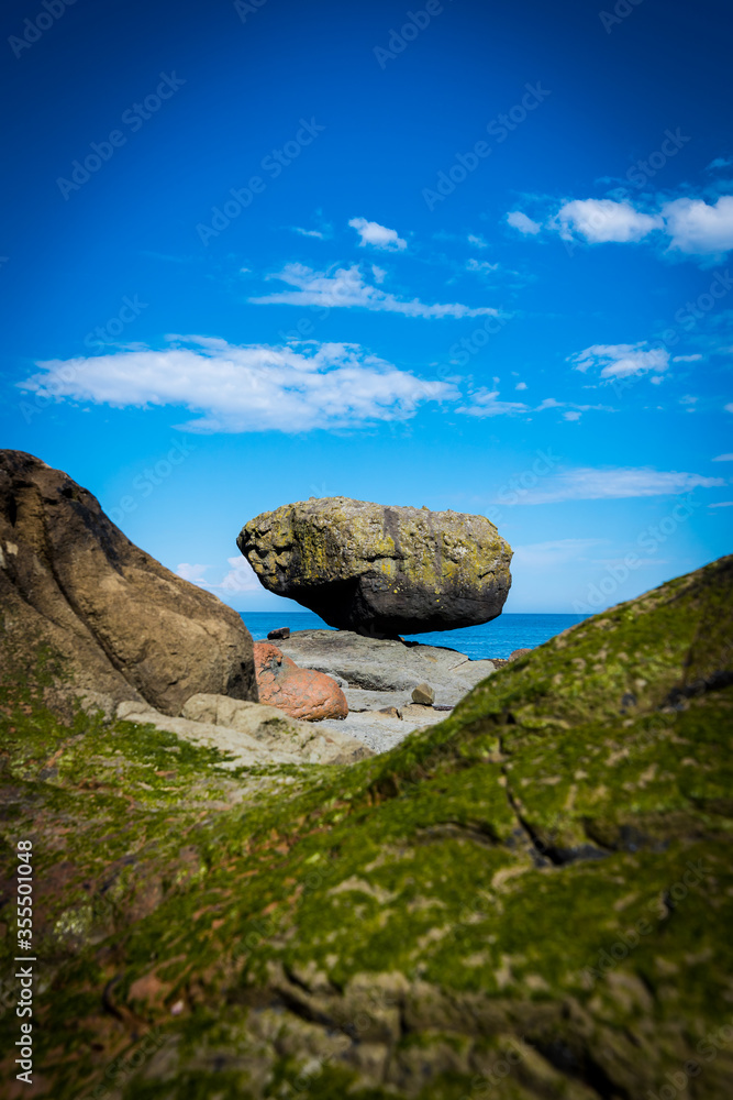 Balance Rock, a popular and famous attraction near the village of Skidegate in Haida Gwaii (formerly Queen Charlotte Islands), British Columbia, Canada.