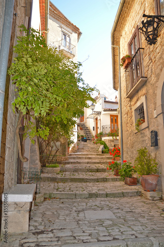 A narrow street between the old houses of San Marco dei Cavoti  a medieval village in the Campania region.