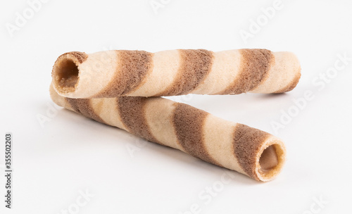 Crispy cream filled wafer roll sticks isolated on white background