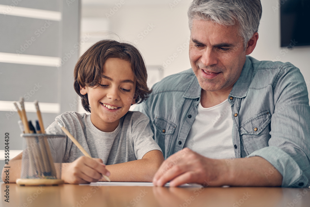 Father and son spending time at home Father and son spending time at home