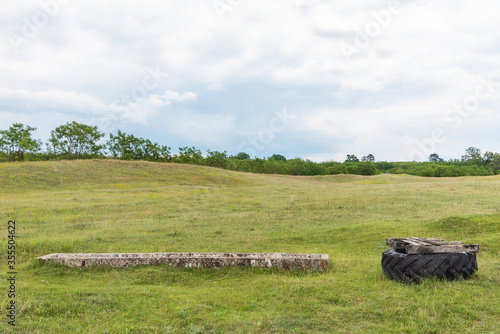 Photography A well and a drinking trough for domestic animals on the farm