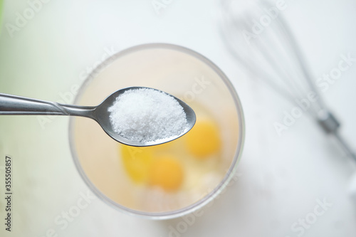 a spoonful of sugar over the yolk. A teaspoon with salt