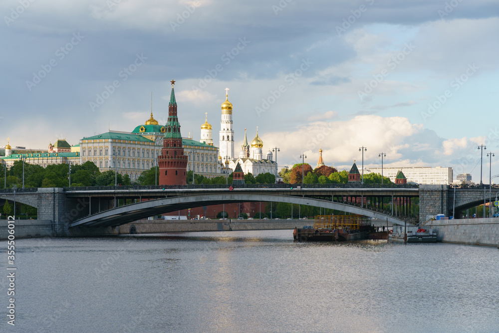 Moscow cityscape in spring. Kremlin wall, Towers, Residence of President of the Russian Federation, Ivan the Great Bell Tower, Dormition Cathedral, Bolshoy Kamenny Bridge Moscow cityscape in spring. Kremlin wall, Towers, Residence of President of the Russian Federation, Ivan the Great Bell Tower, Dormition Cathedral, Bolshoy Kamenny Bridge