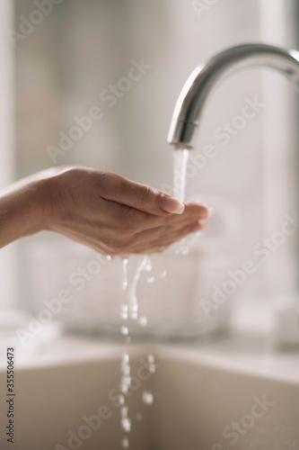 Close up of woman wash her hands.