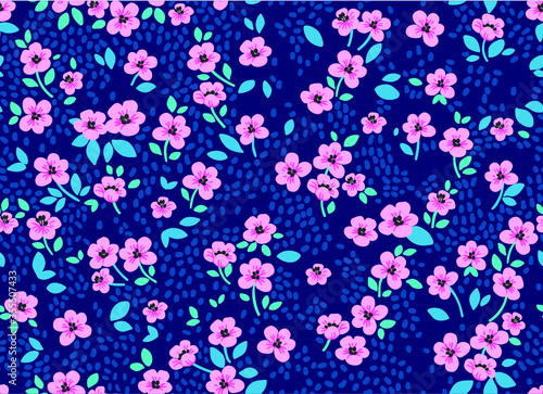 Vintage floral background. Seamless vector pattern for design and fashion prints. Flowers pattern with small pink flowers on a dark blue background. Ditsy style. 
