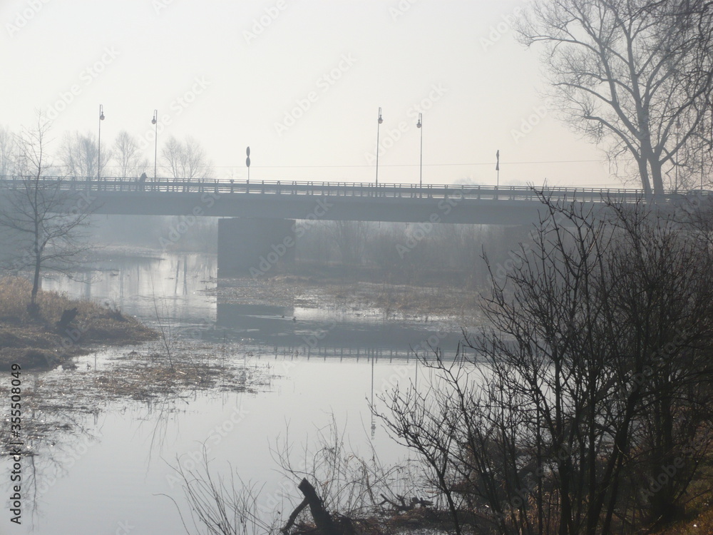 Warta river and bridge in Poland, cold weather Warta river and bridge in Poland, cold weather