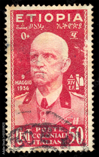 ITALY - CIRCA 1936: A stamp printed in Italy, shows the Emperor Victor Emmanuel III, 9 May, 1936 to commemorate the day that Ethiopia was annexed by Italy. circa 1936