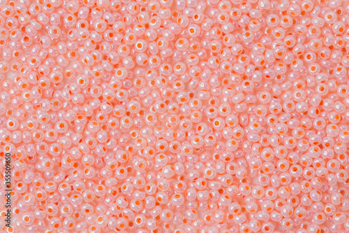 Beads pink as background texture close-up