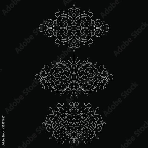 Calligraphic design elements isolated on black background set 2